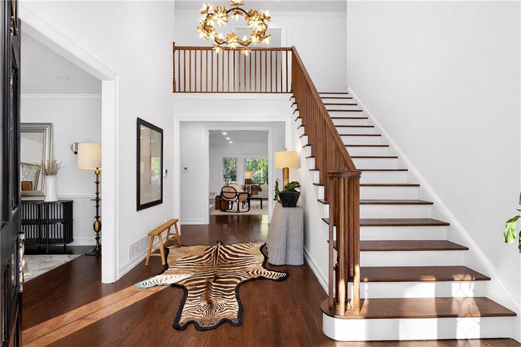 1330 West Wesley Road Northwest Atlanta, GA 30327 - Photo 3 of 46 a view of entryway and hall with wooden floor