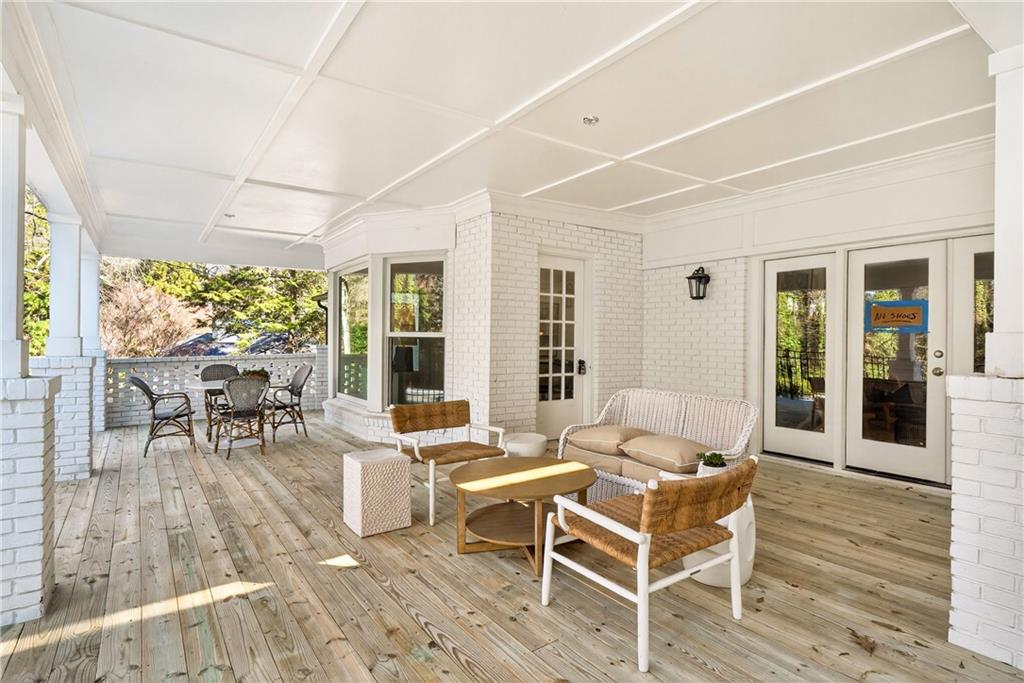 1330 West Wesley Road Northwest Atlanta, GA 30327 - Photo 38 of 46 a living room with furniture and a large window