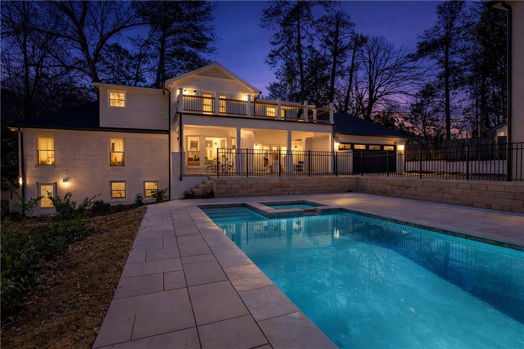 1330 West Wesley Road Northwest Atlanta, GA 30327 - Photo 42 of 46 a front view of a house with a yard