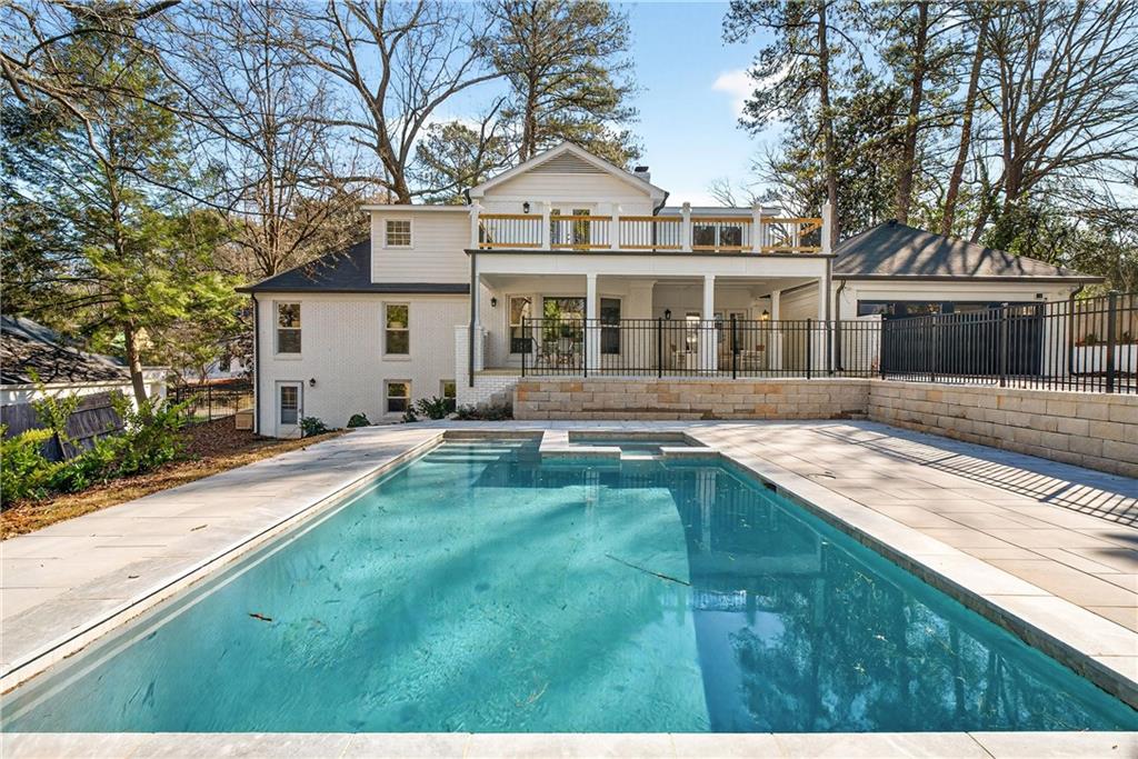 1330 West Wesley Road Northwest Atlanta, GA 30327 - Photo 43 of 46 a front view of a house with a yard