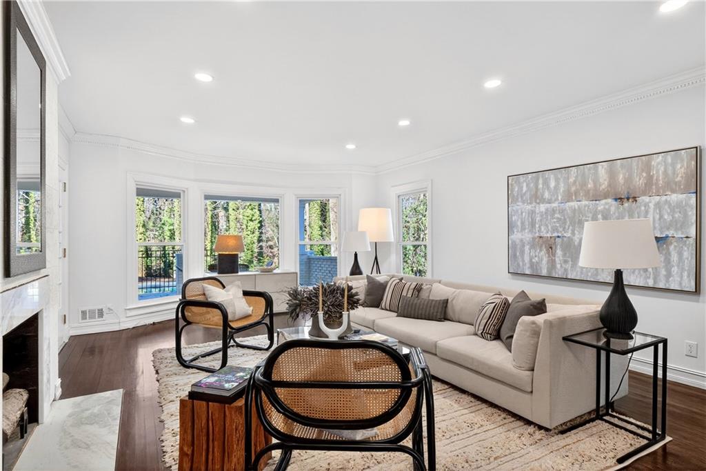 1330 West Wesley Road Northwest Atlanta, GA 30327 - Photo 9 of 46 a living room with furniture and a large window