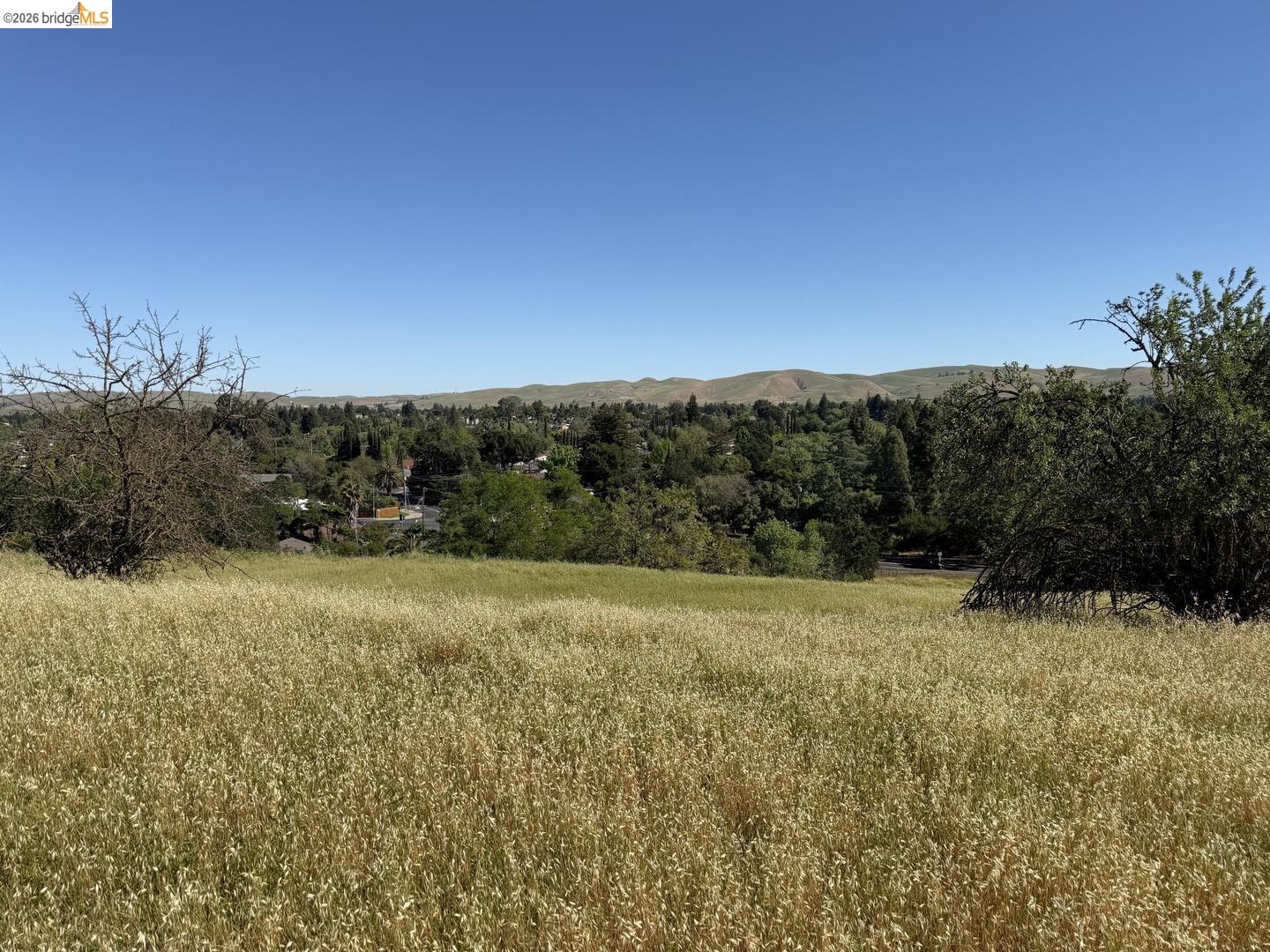 0 Cowell Road Concord, CA 94518 - Photo 11 of 12 Expansive natural landscape with rolling hills and distant residential structures