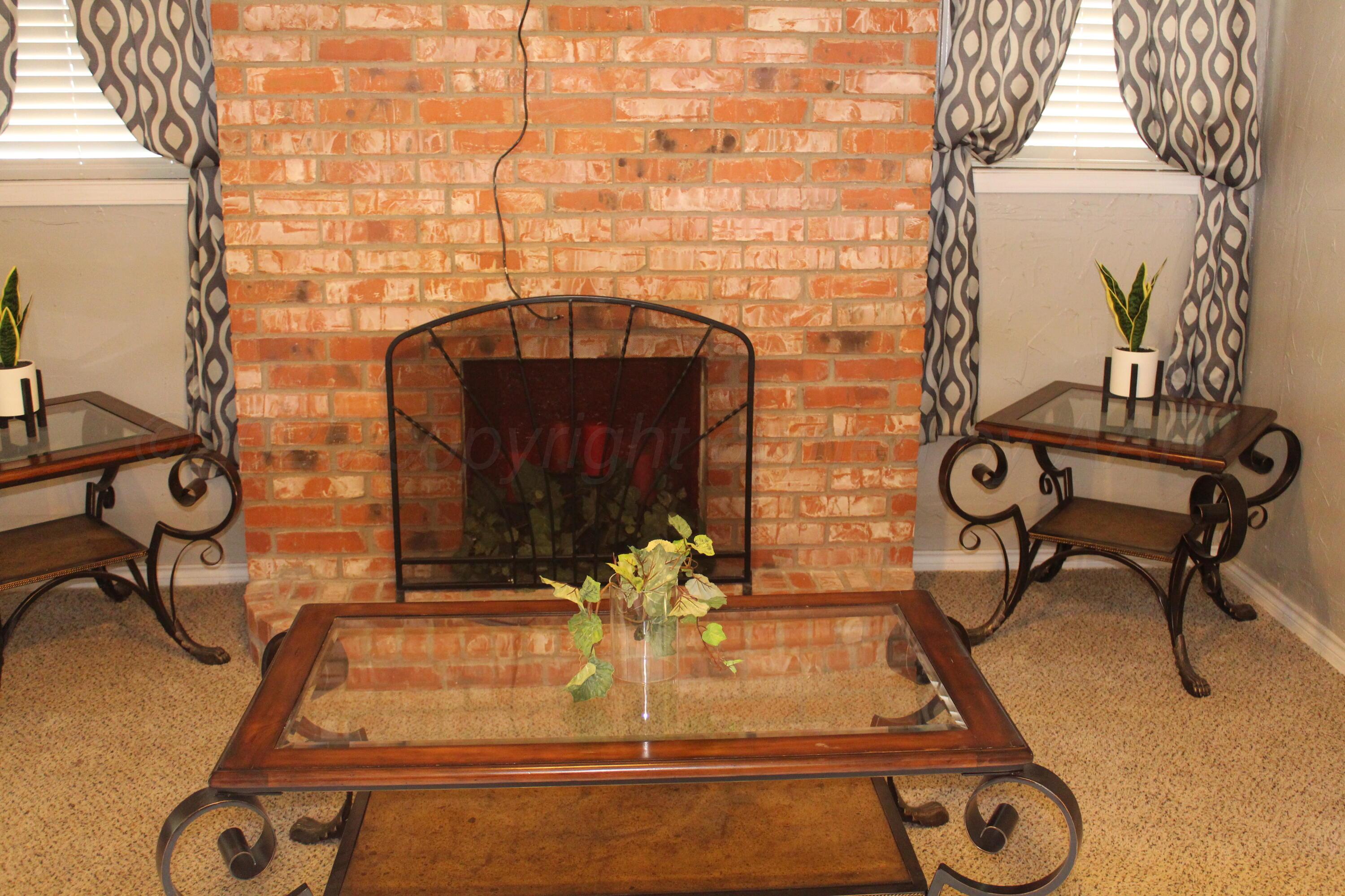 608 North 10th Street Memphis, TX 79245 - Photo 14 of 32 a bathroom with a sink and a mirror