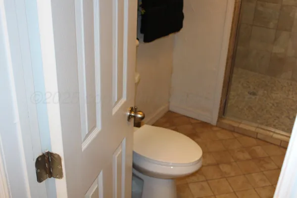 a bathroom with a sink and toilet