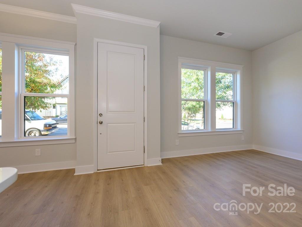 5915 Ardrey Kell Road Charlotte, NC 28105 - Photo 2 of 32 a view of an empty room with a window
