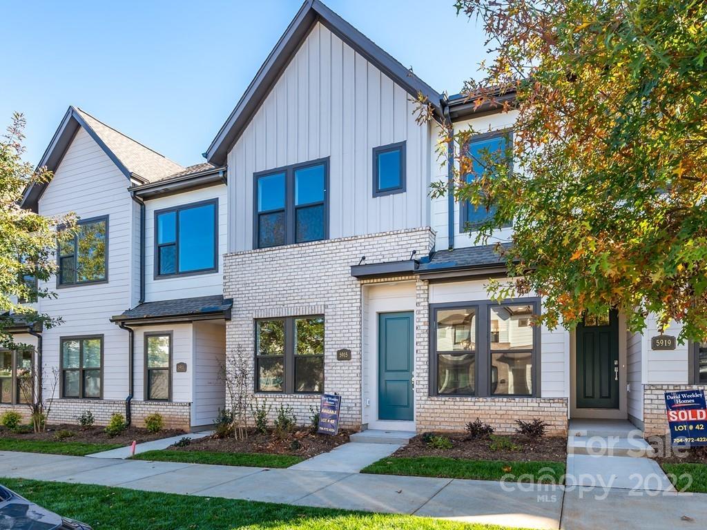 5915 Ardrey Kell Road Charlotte, NC 28105 - Photo 29 of 32 a front view of a house with yard and green space