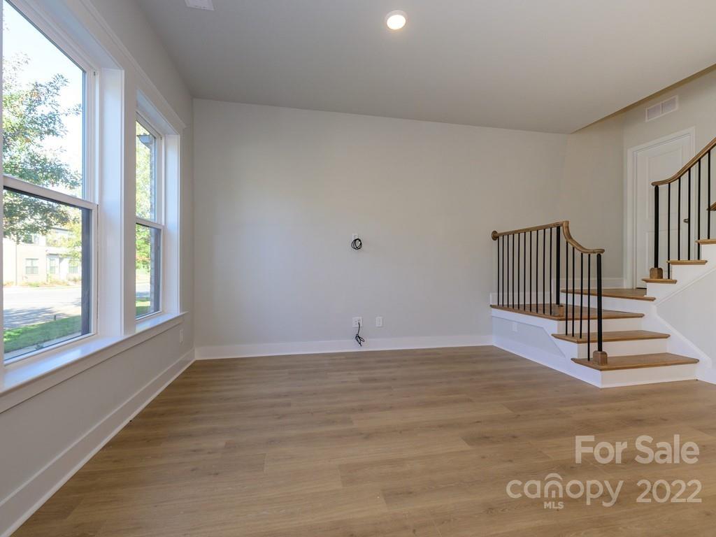 5915 Ardrey Kell Road Charlotte, NC 28105 - Photo 4 of 32 a view of an empty room with a window