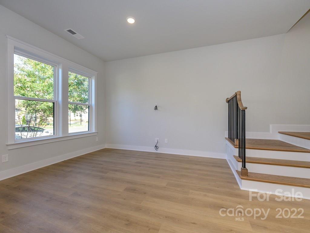 5915 Ardrey Kell Road Charlotte, NC 28105 - Photo 5 of 32 a view of an empty room with a window