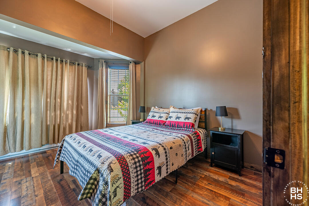 6143 Sentinel Road, Unit # 1 Lake Placid, NY 12946 - Photo 6 of 19 Downhill1Condo_Summer_Bedroom1