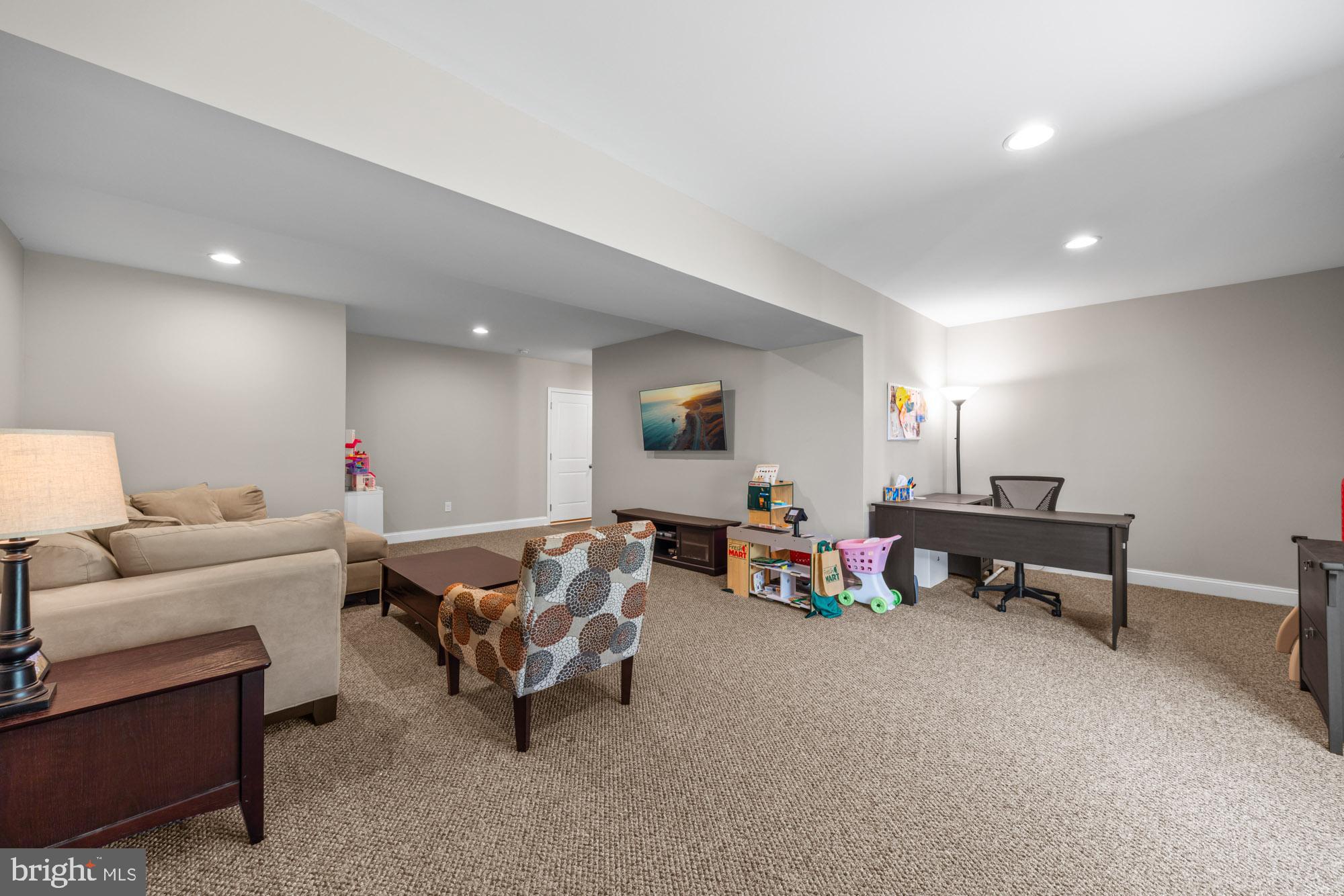 89 Isabelle Court Marlton, NJ 08053 - Photo 17 of 31 a living room with furniture and a flat screen tv