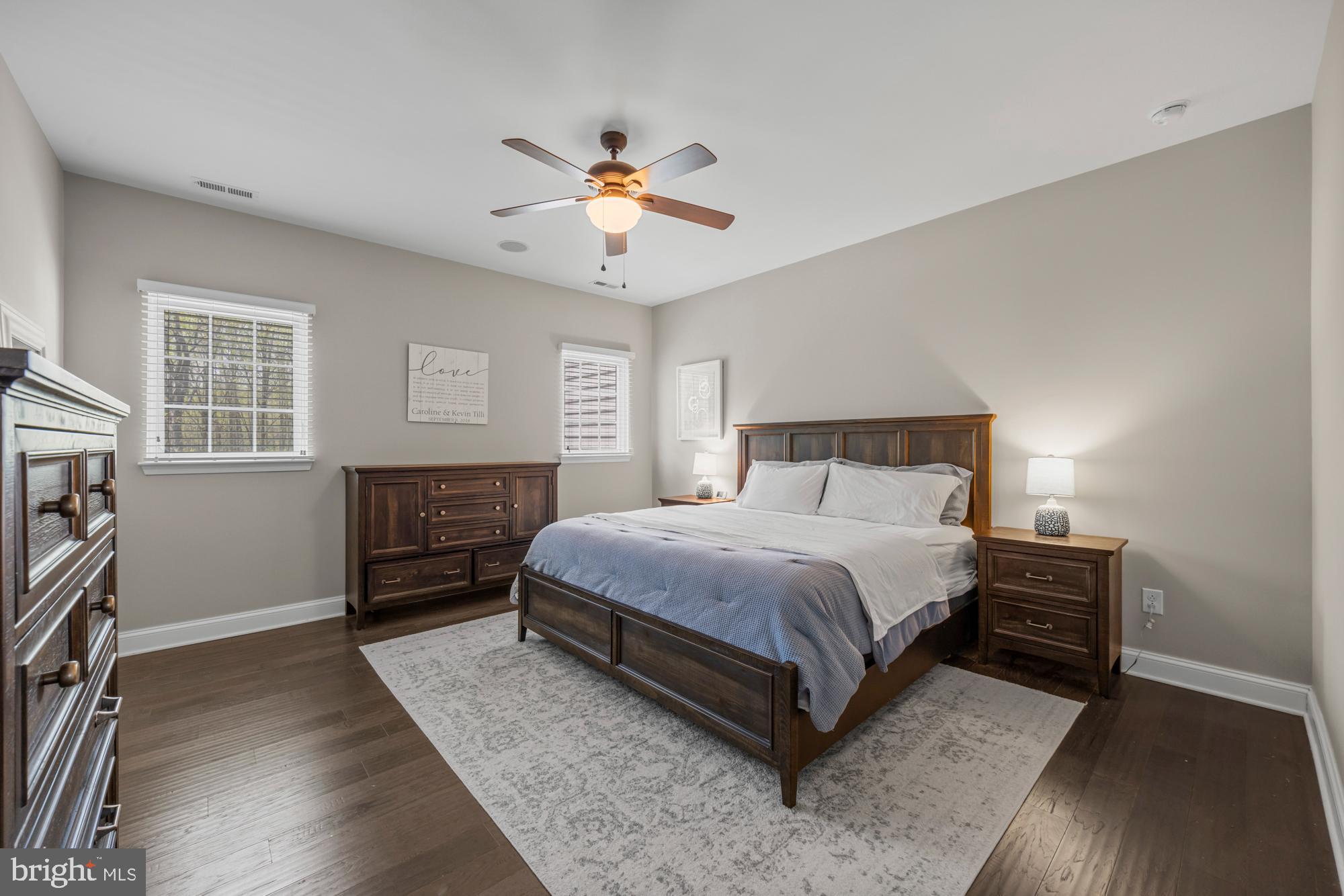 89 Isabelle Court Marlton, NJ 08053 - Photo 19 of 31 a bedroom with a bed and a chandelier