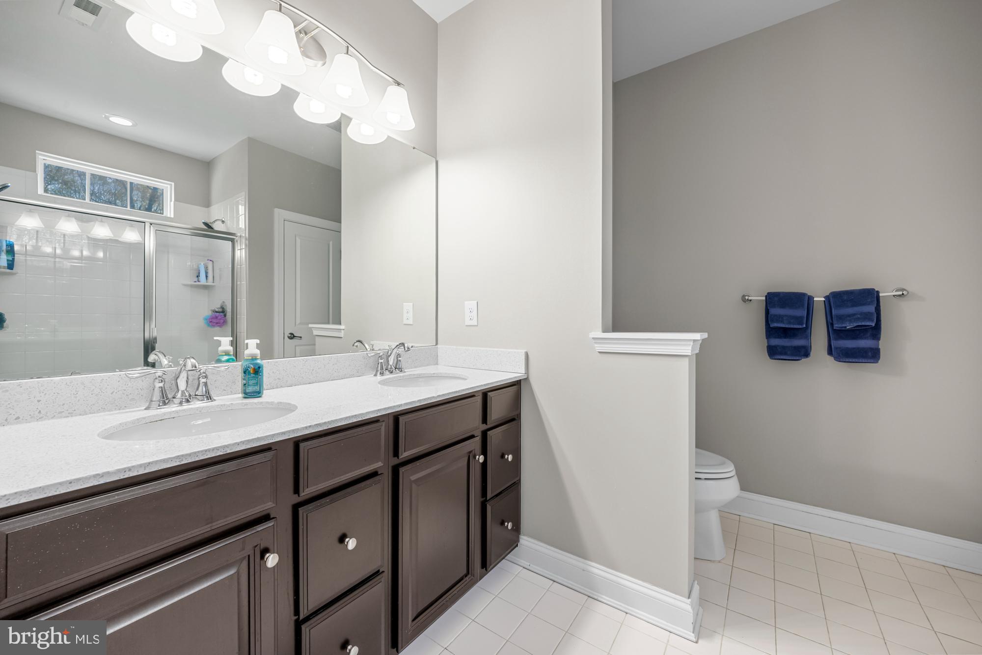 89 Isabelle Court Marlton, NJ 08053 - Photo 22 of 31 a bathroom with a double vanity sink and a mirror
