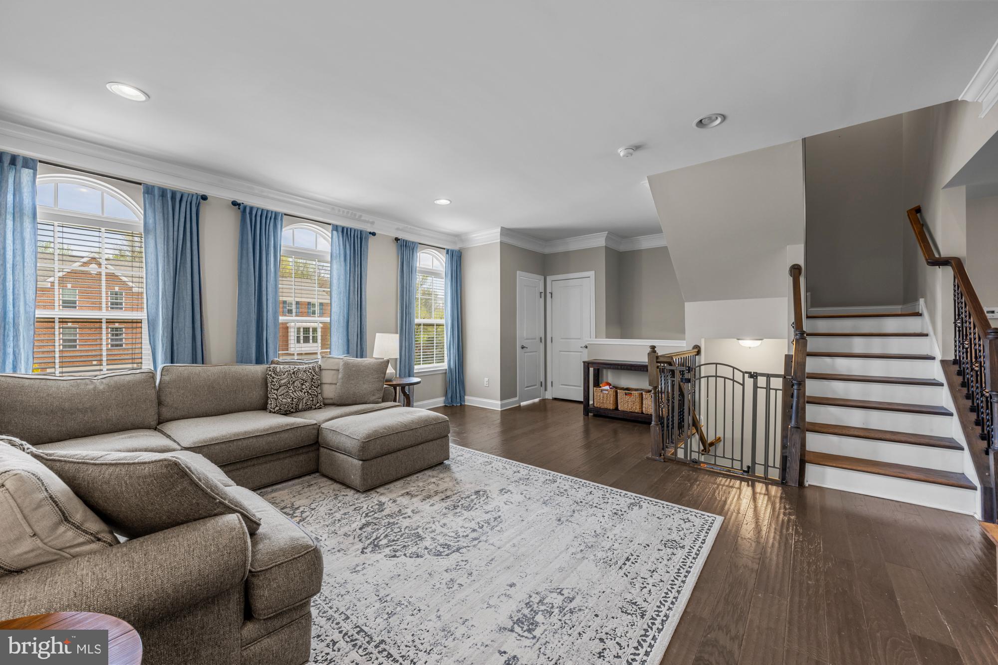 89 Isabelle Court Marlton, NJ 08053 - Photo 3 of 31 a living room with furniture and a dining table with wooden floor
