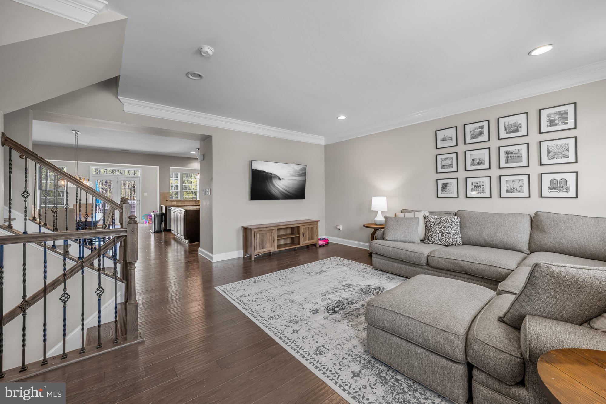 89 Isabelle Court Marlton, NJ 08053 - Photo 4 of 31 a living room with furniture and a flat screen tv