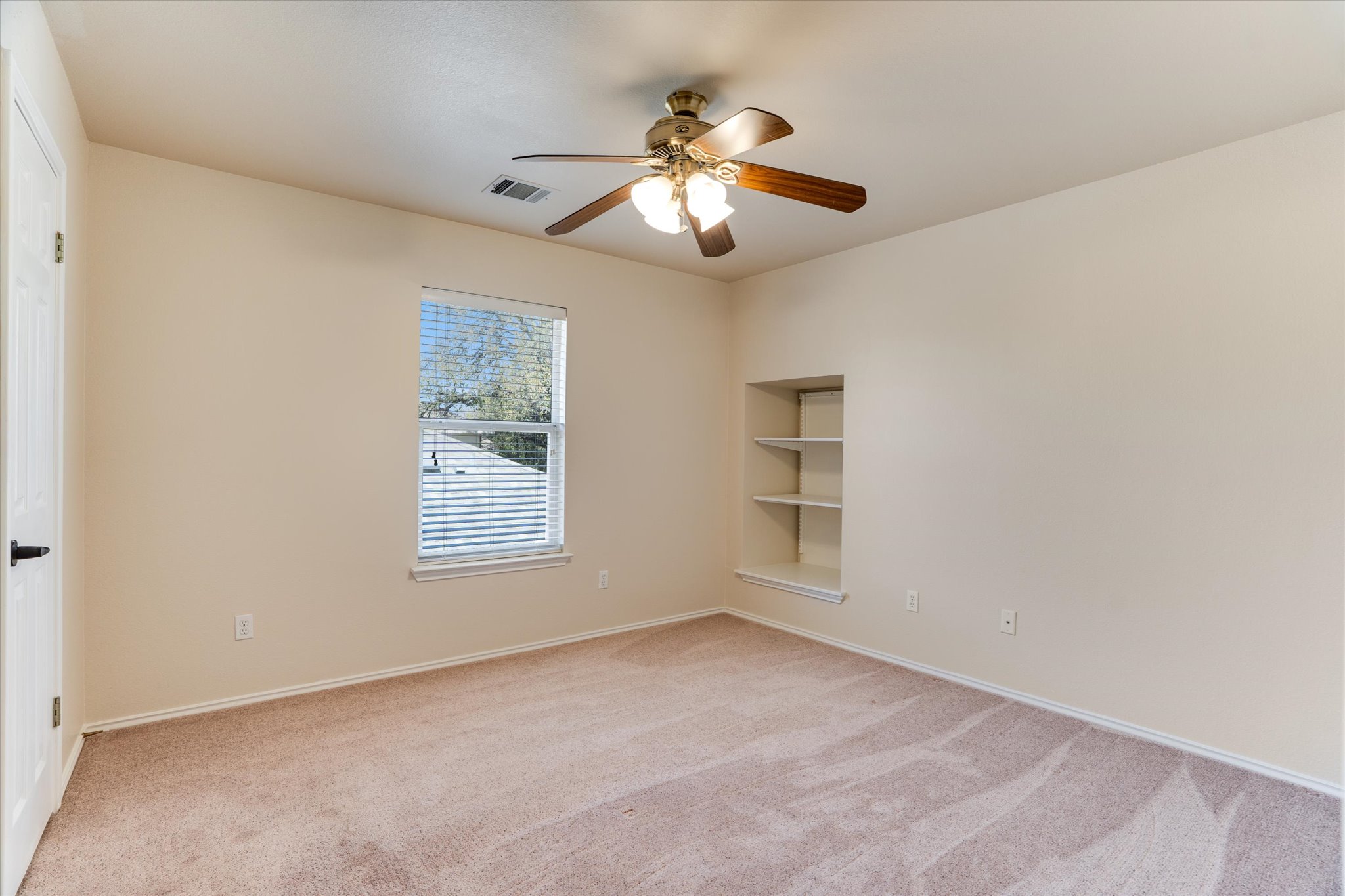 2207 Clover Ridge Drive Cedar Park, TX 78613 - Photo 15 of 21 a view of an empty room with a window