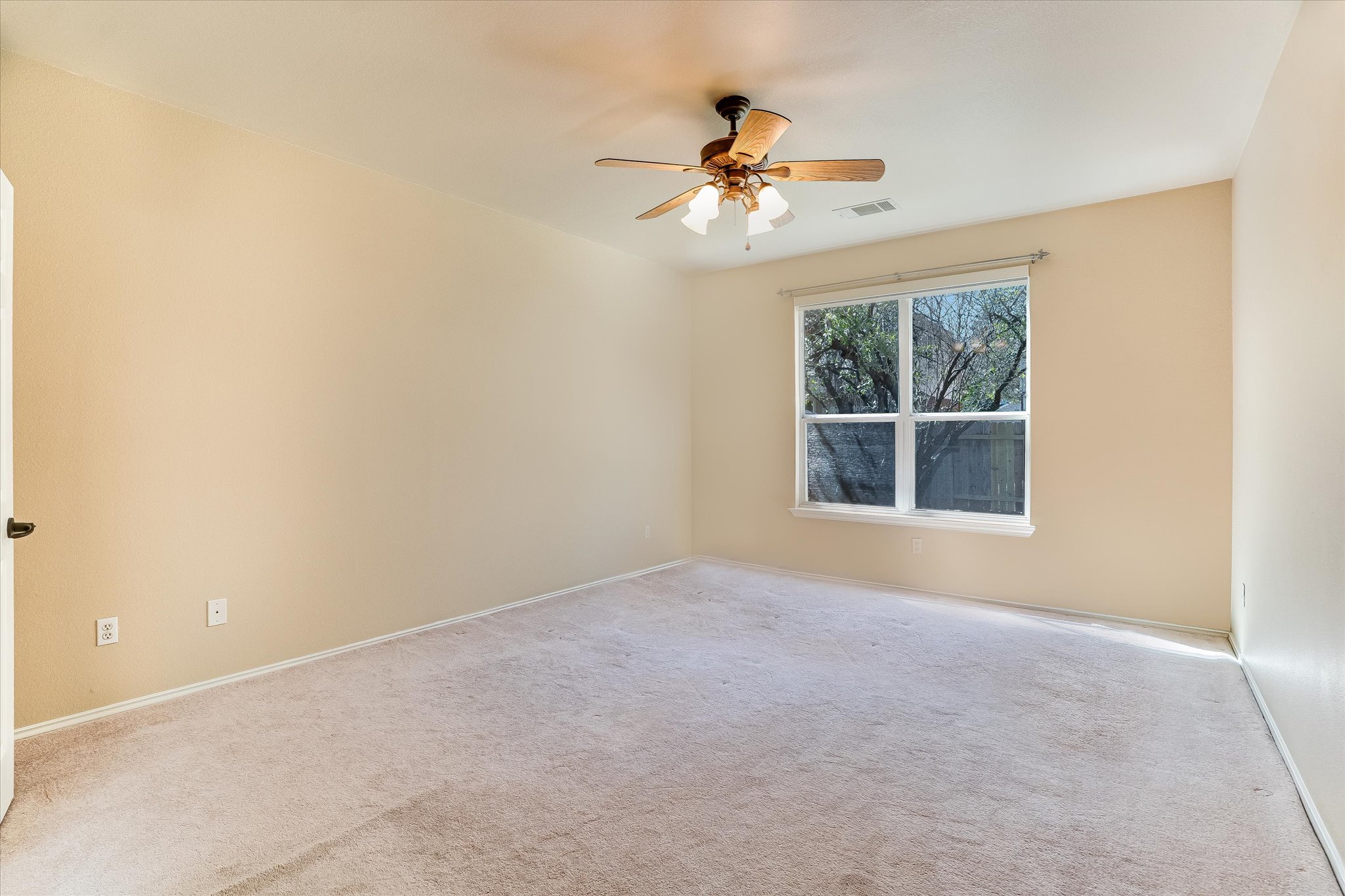 2207 Clover Ridge Drive Cedar Park, TX 78613 - Photo 9 of 21 a view of an empty room with a window