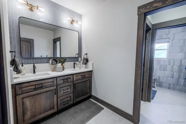 a bathroom with a sink and a shower