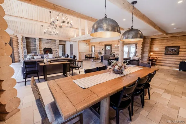 a dining table and chairs in a kitchen