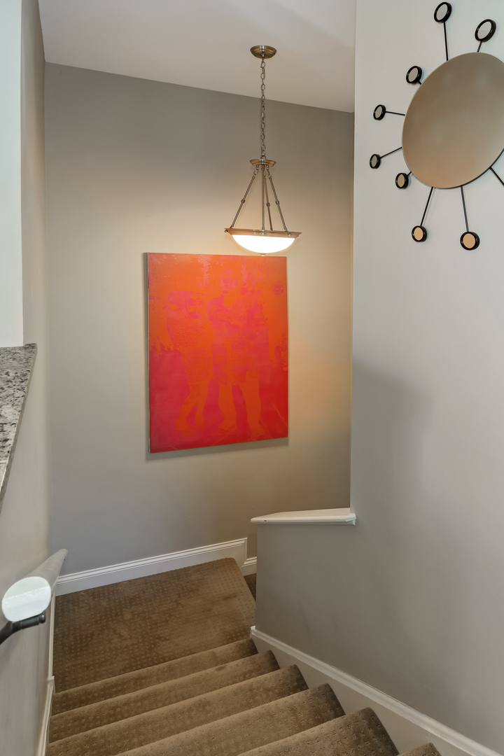 11 Foxcroft Road, Unit 219 Naperville, IL 60565 - Photo 2 of 16 a bathroom with a sink and a mirror