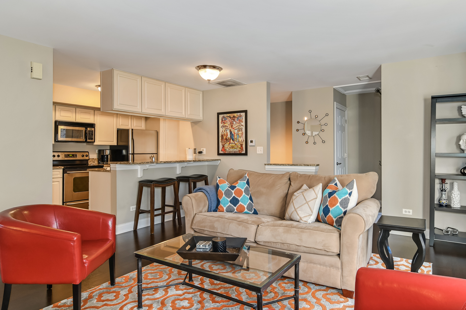 11 Foxcroft Road, Unit 219 Naperville, IL 60565 - Photo 5 of 16 a living room with furniture and kitchen view
