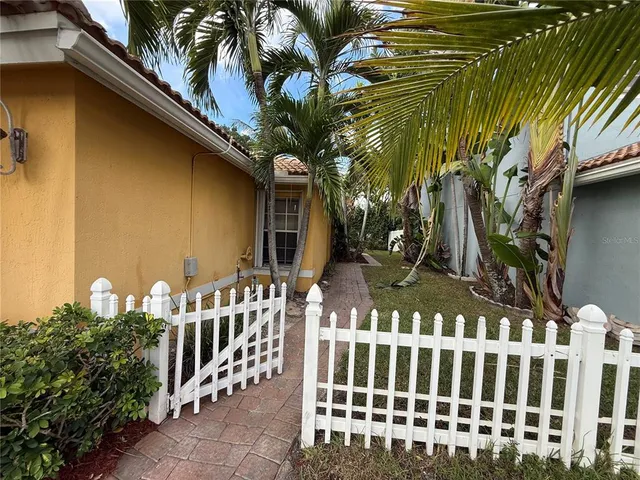 a view of a house with a small yard