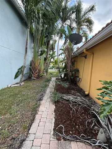 a view of a backyard of the house