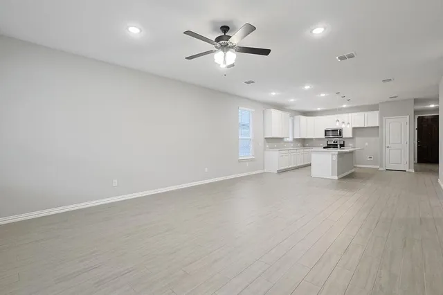 a bathroom with a double vanity sink and mirror