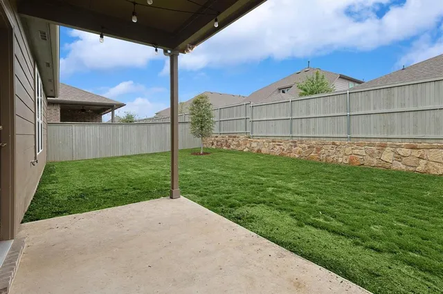 a front view of a house with yard