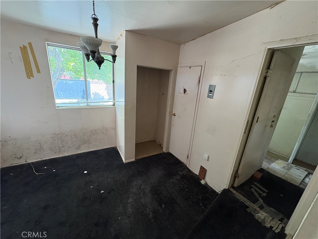 14023 Studebaker Road Norwalk, CA 90650 - Photo 23 of 33 a view of an empty room with a window