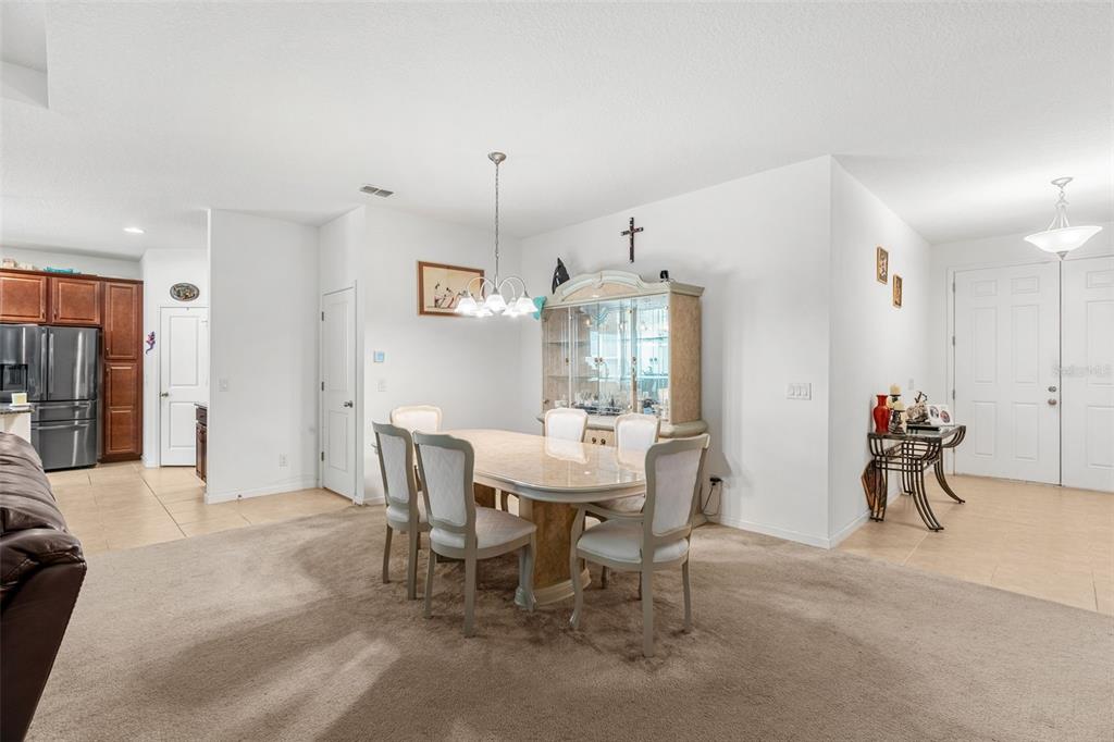 2085 Lula Road Minneola, FL 34715 - Photo 12 of 39 a view of a dining room with furniture