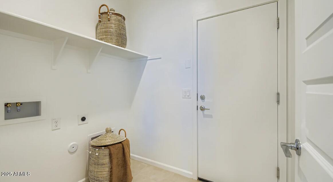 9646 West Verde Lane Phoenix, AZ 85392 - Photo 19 of 24 Laundry Room