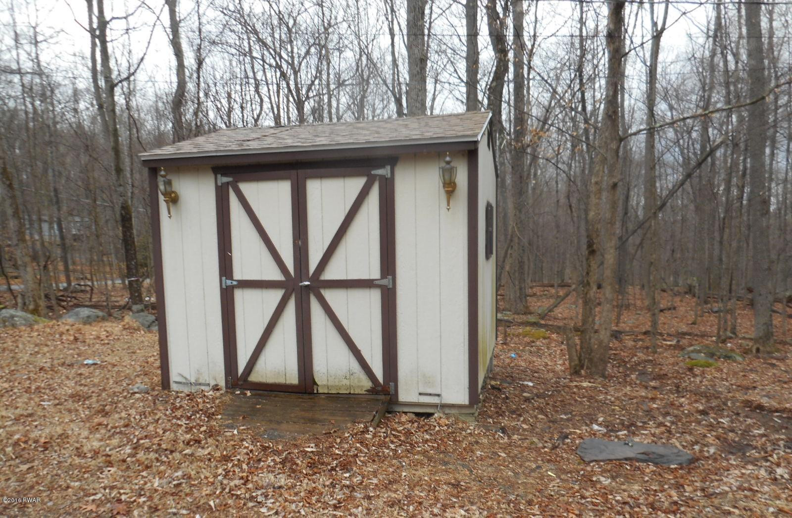 544 Hummingbird Lane Hawley, PA 18428 - Photo 6 of 16 a view of a wooden door