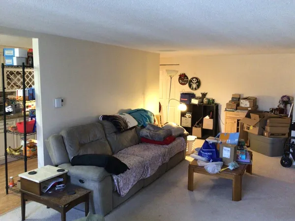 a bedroom with a workspace