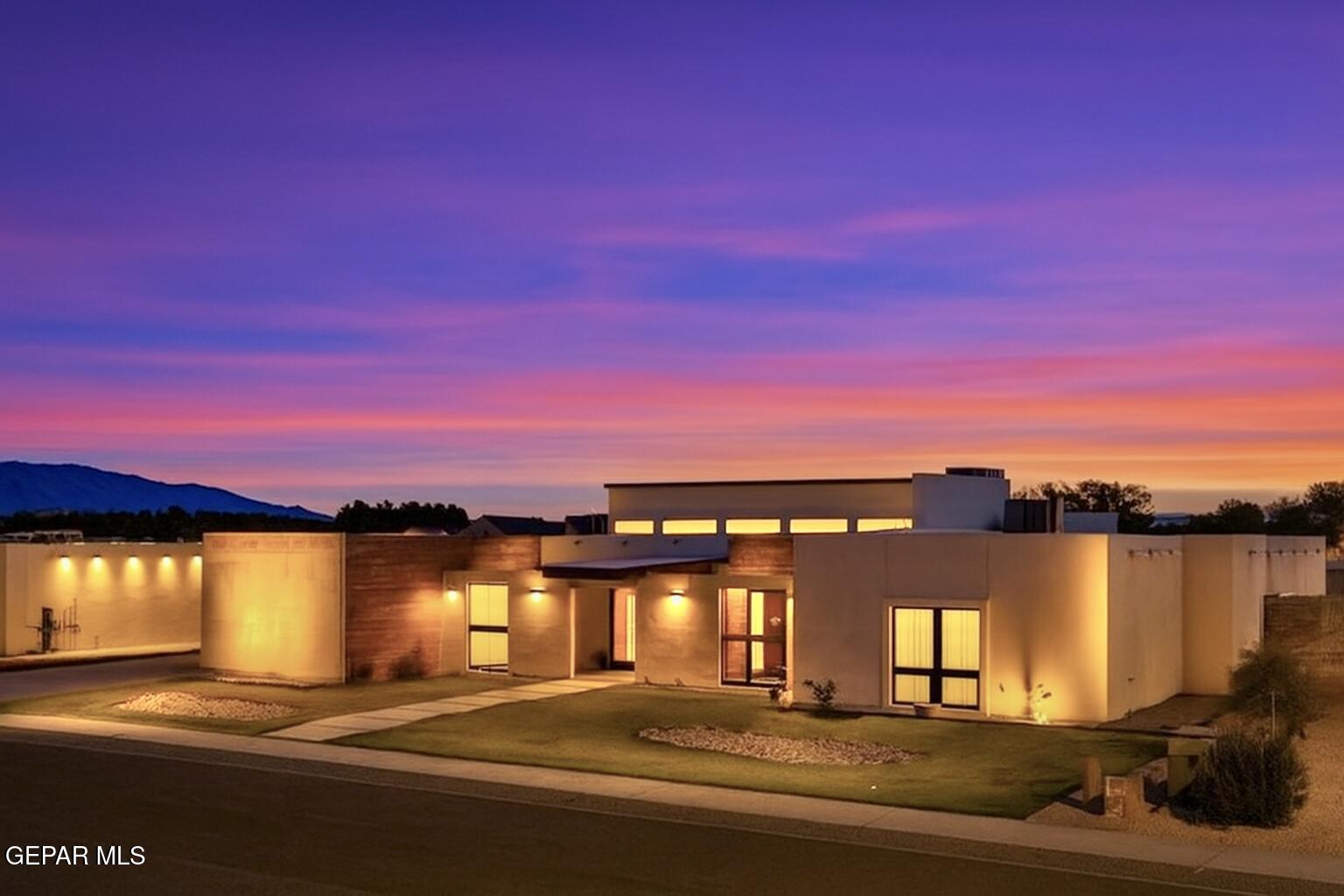 a view of a lake with a building in the background