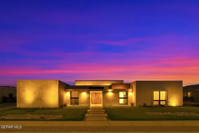 a backyard of a house with seating space