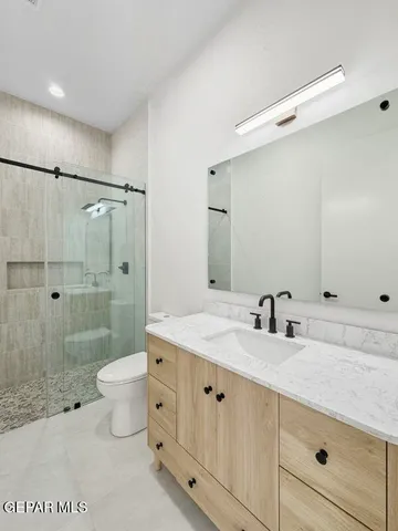 a kitchen with a stove and a microwave