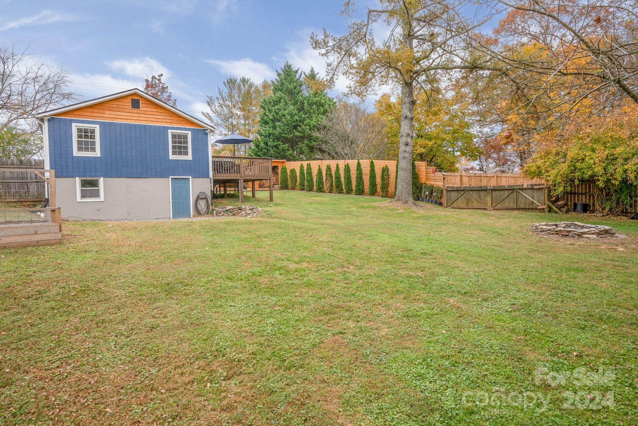 307 Tabernacle Road Black Mountain, NC 28711 - Photo 20 of 27 a front view of a house with a yard and garage