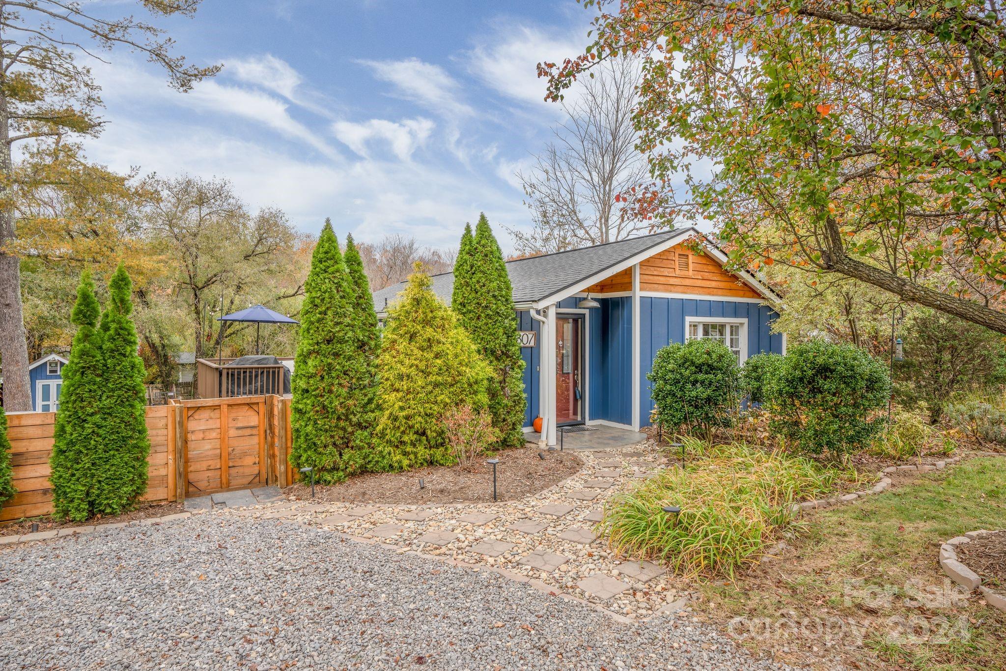 307 Tabernacle Road Black Mountain, NC 28711 - Photo 25 of 27 a front view of a house with garden