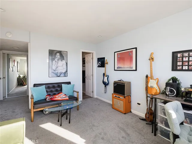 a living room with furniture and a couch