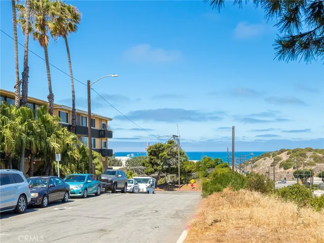 a view of street with cars