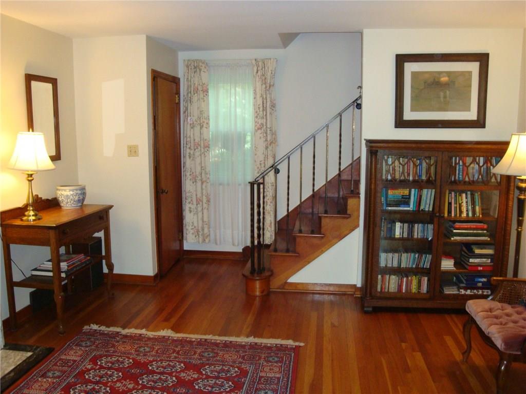 108 Rutledge Drive Fox Chapel, PA 15215 - Photo 4 of 24 Oil rubbed bronze railings leading upstairs to 3 generous sized bedrooms and family bath