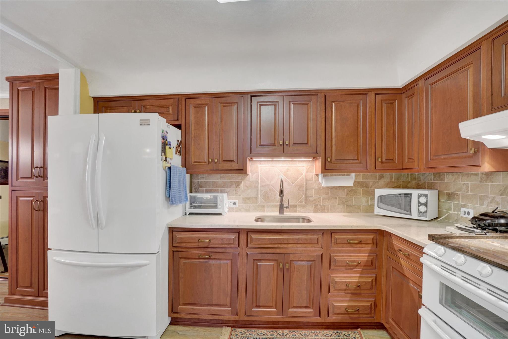 428 Edgehill Road York, PA 17403 - Photo 12 of 27 a white refrigerator freezer sitting inside of a kitchen