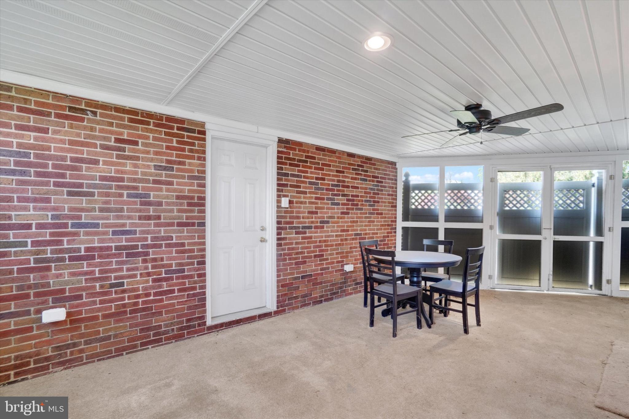 428 Edgehill Road York, PA 17403 - Photo 23 of 27 a dining room with furniture and a floor to ceiling window