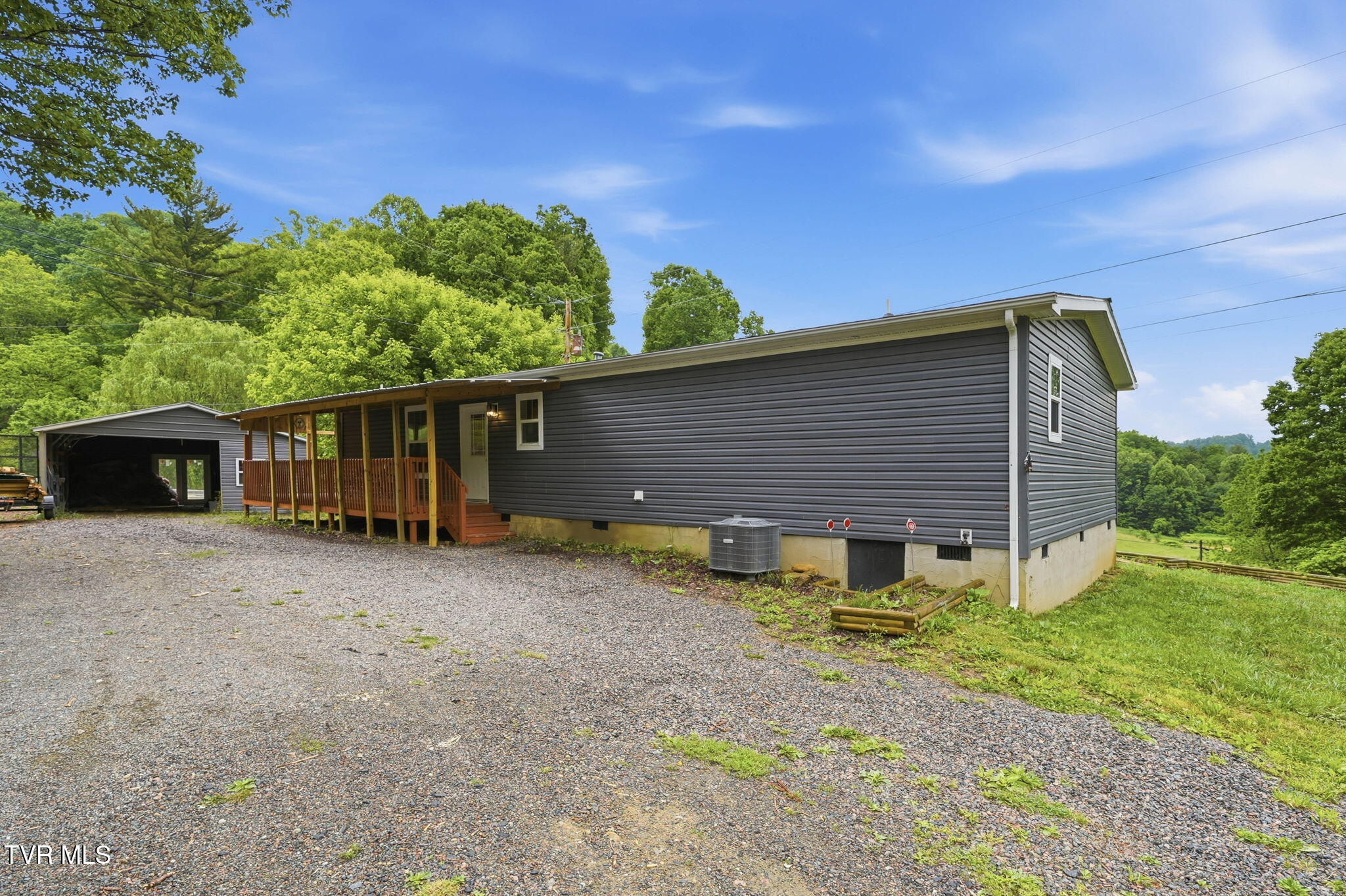 1479 Poga Road Butler, TN 37640 - Photo 10 of 31 back parking