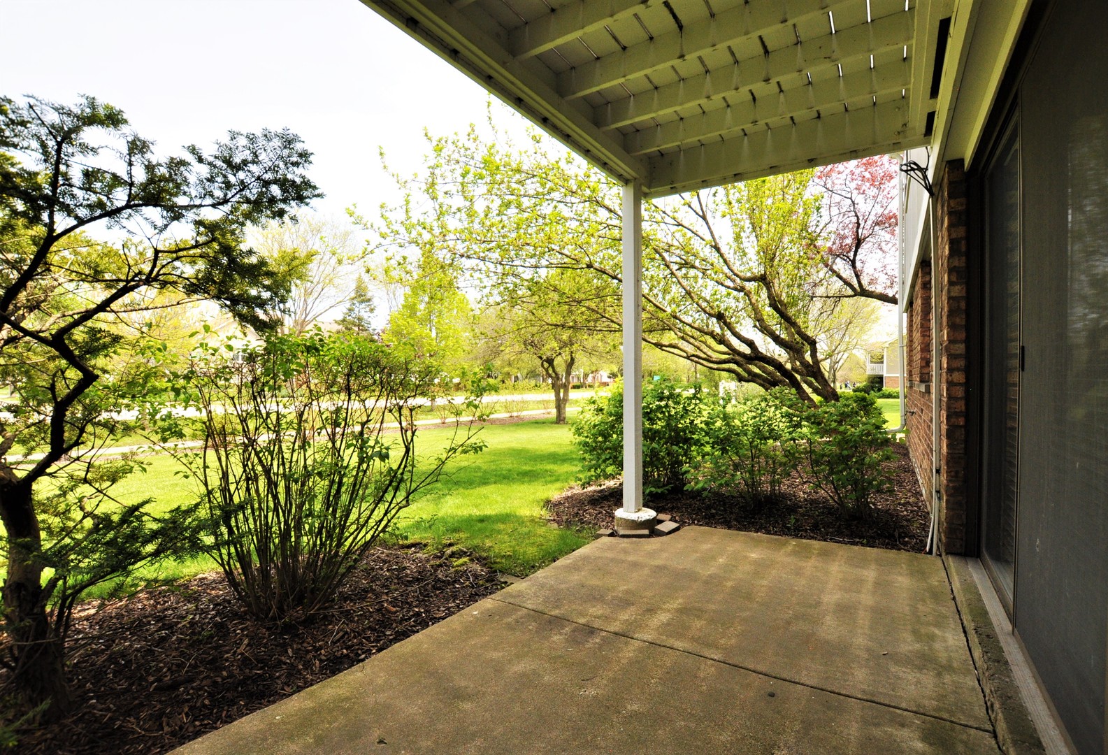 216 Deerpath Court, Unit D1 Schaumburg, IL 60193 - Photo 11 of 16 a view of a garden