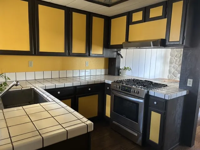 a room with wooden floor and a window