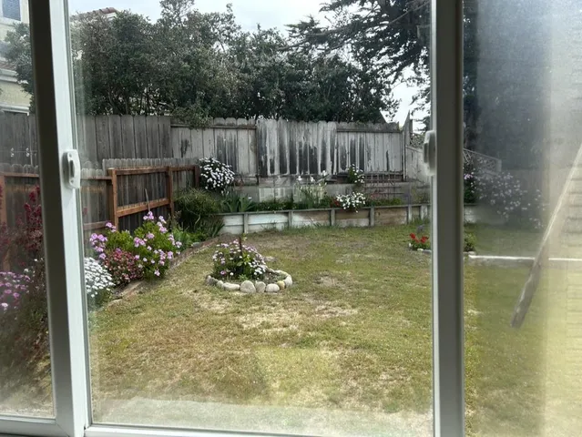 an aerial view of residential house with outdoor space