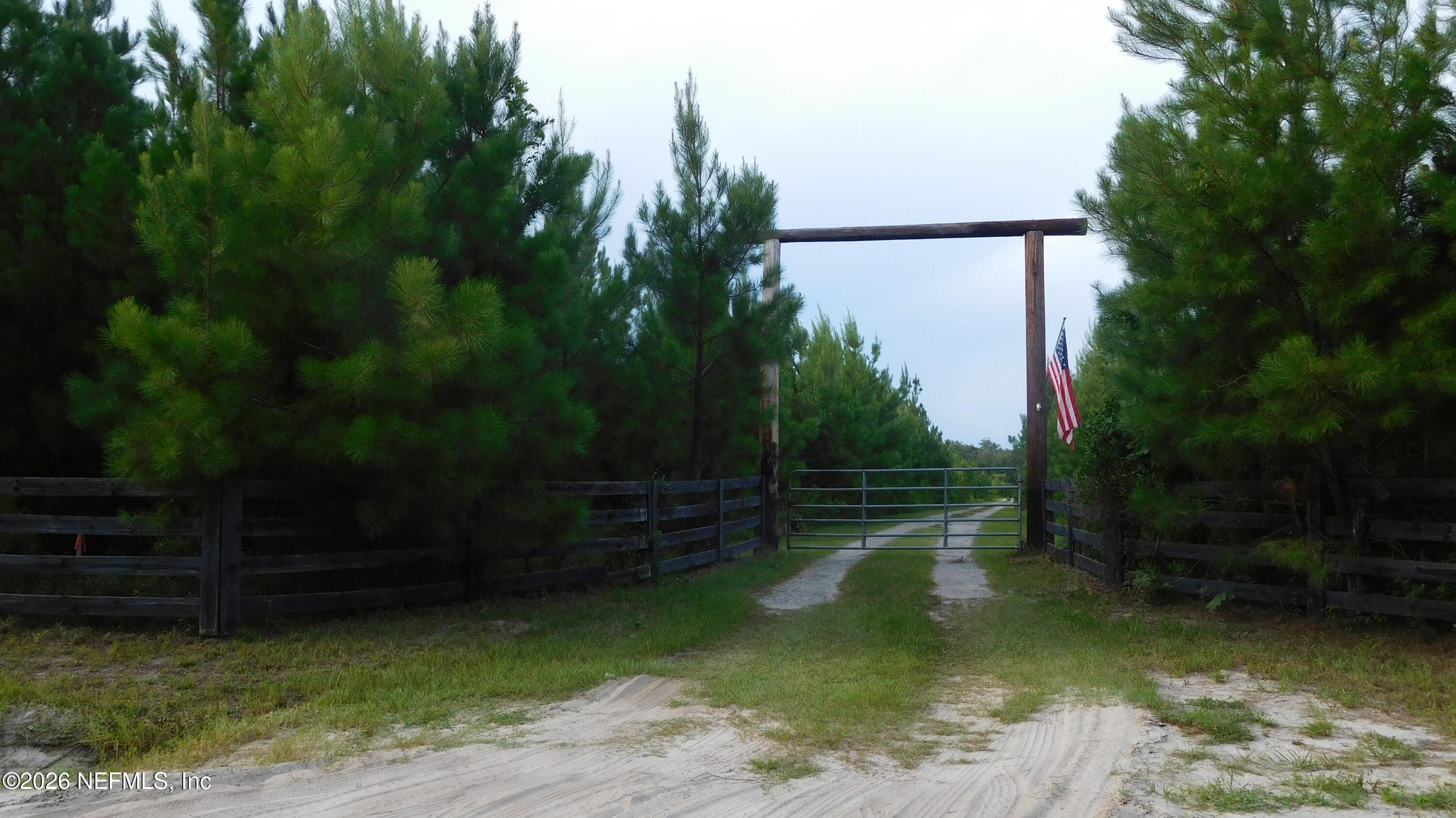 56585 Davis Road Callahan, FL 32011 - Photo 1 of 5 Gate Entrance