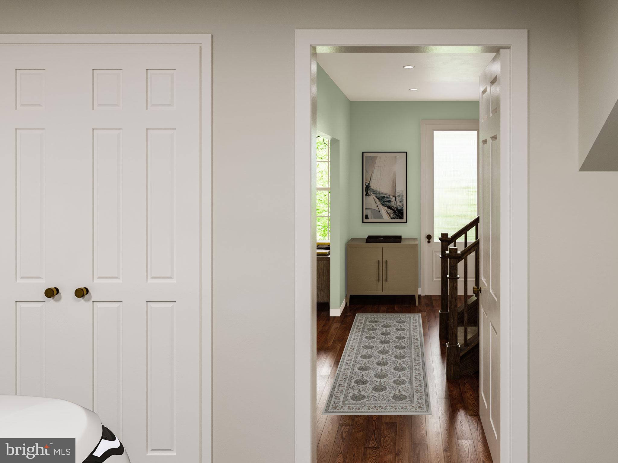 7 Sage Street Carlisle, PA 17015 - Photo 19 of 27 a view of a hallway with wooden floor and a bathroom