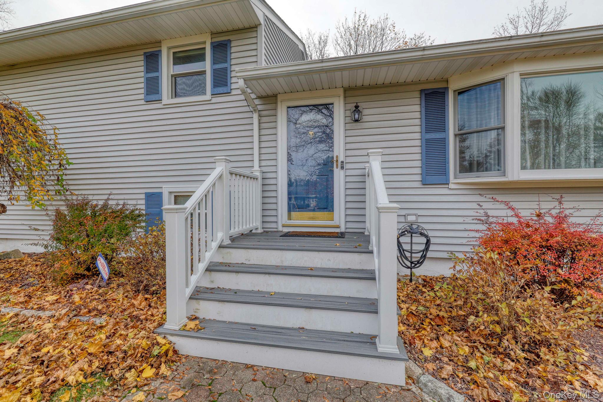4 Irene Court Fishkill, NY 12524 - Photo 24 of 46 a front view of a house with a garden